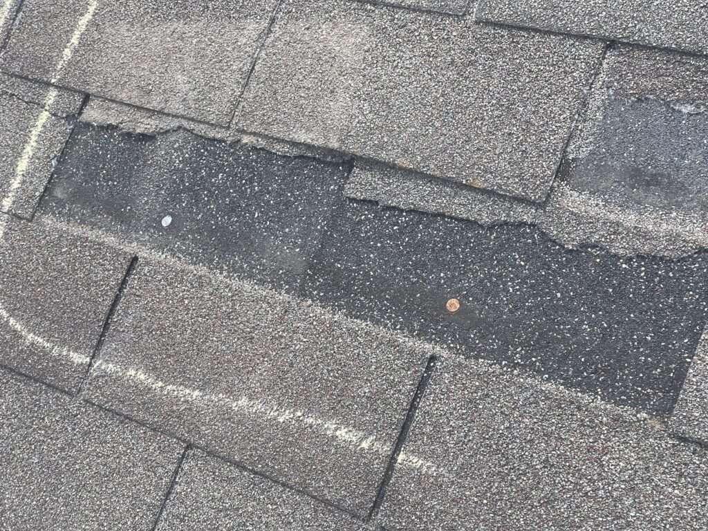 missing shingles from storm